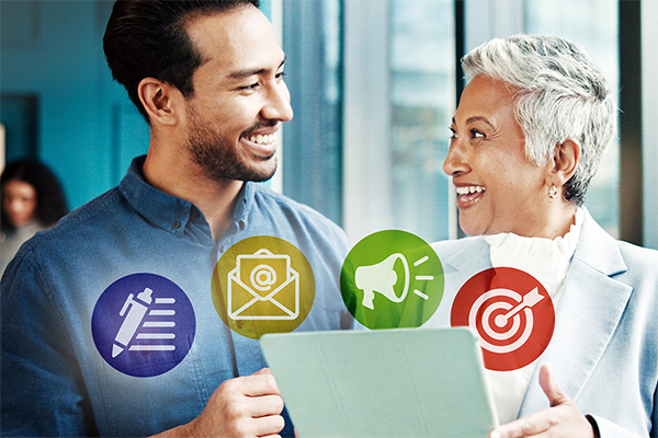 two smiling businesspeople with marketing icons overlayed