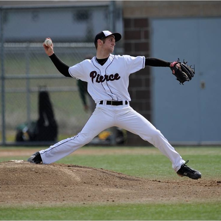 raider baseball player throws pitch