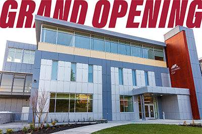 photo of Olympic building with header of grand opening
