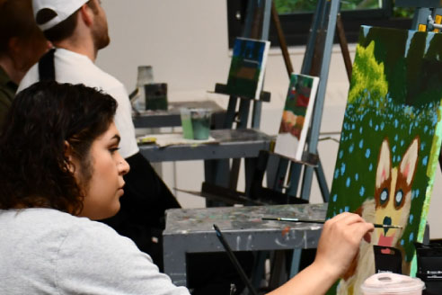 Students discussing at table