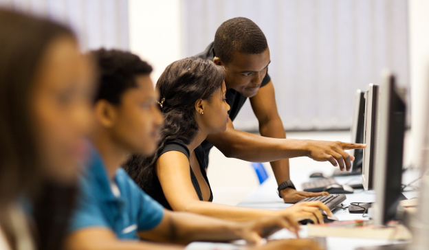 Computer science instructor teaching students core skills.