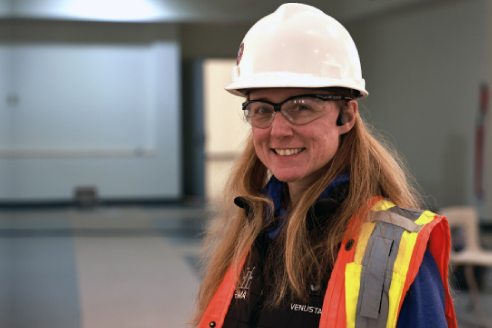 Construction Management student in hard hat and vest