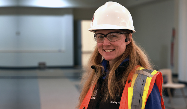 Construction Management student in hard hat and vest