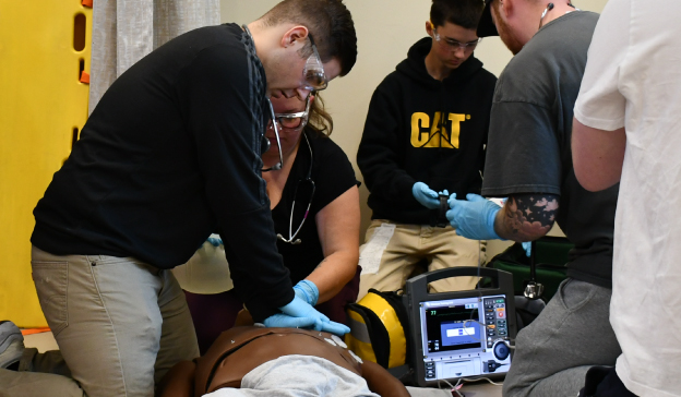 Students simulating resuscitation procedures