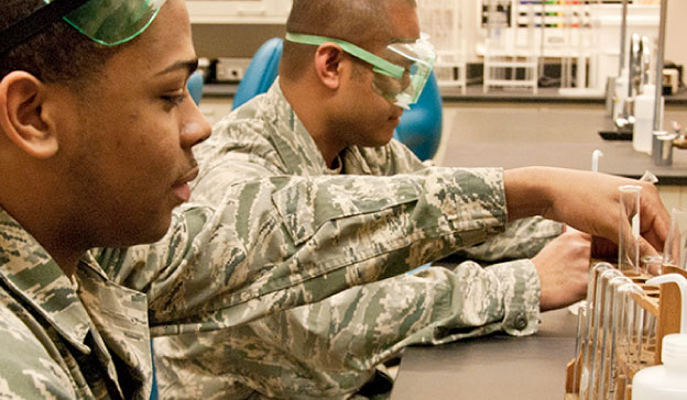 Military students engaged in a science class