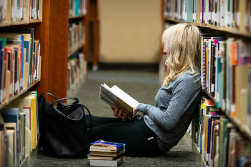 Students discussing at table