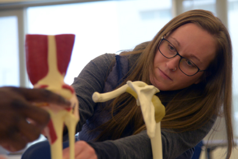 Students discussing at table