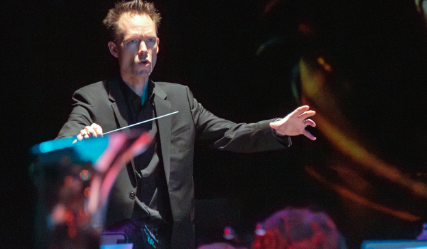 conductor in front of orchestra