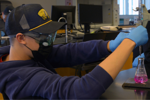 Student working in a science lab.