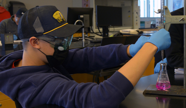 Student working in a science lab.