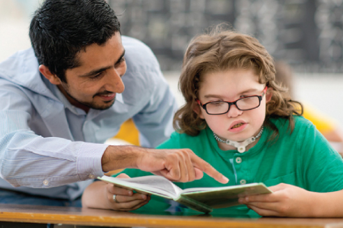 Students discussing at table
