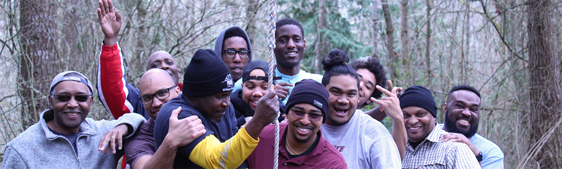 Students and staff at Black and Brown Men's Retreat