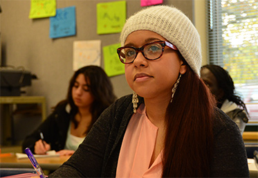 student listening in classroom