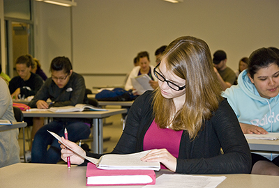 students studying in a classroom