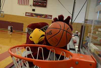 Raider mascot playing basketball