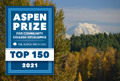 2021 Aspen Prize logo superimposed on a campus photo of Mount Rainier