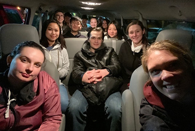 Pierce College students in a van on the way to a volunteer event.