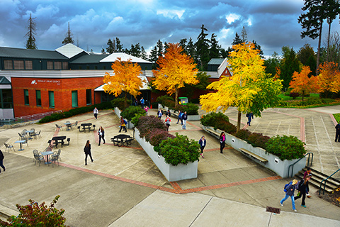 Students walking outdoors on the Pierce College Puyallup campus