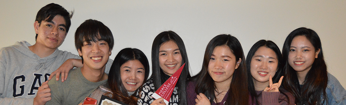 group photo of smiling international students