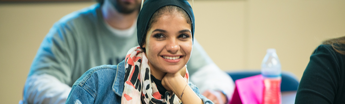 smiling student in classroom smiling student in classroom