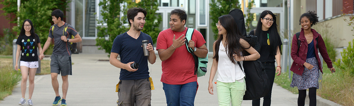 students walking out of building