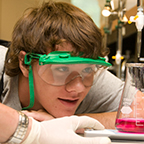 Student in a chemistry lab Student in a chemistry lab