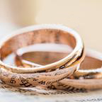 two wedding bands on a table