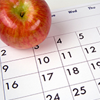 upcoming events calendar and clock on table