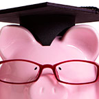 Saving for college piggybank wearing glasses and a graduation cap