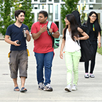Students walking outside the Rainier building Students walking outside the Rainier building
