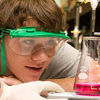 Student in a chemistry lab Student in a chemistry lab